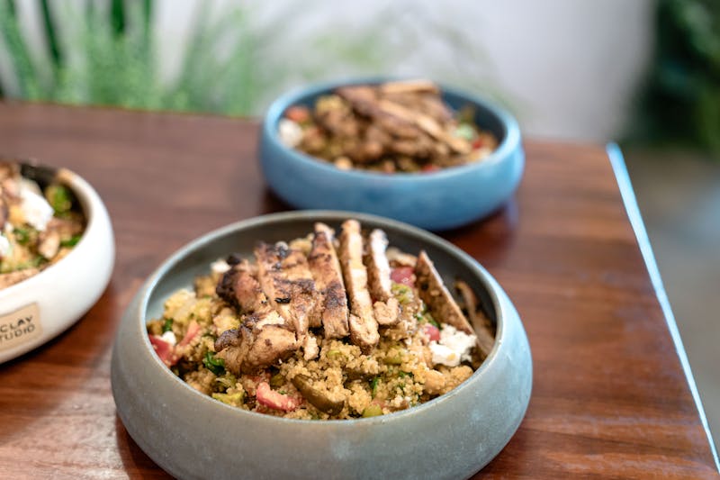 Starbird chicken grain bowl with farro and roasted vegetables