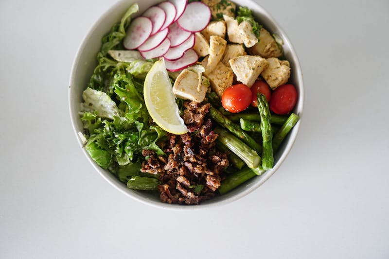 Caesar crunch chicken salad bowl with parmesan